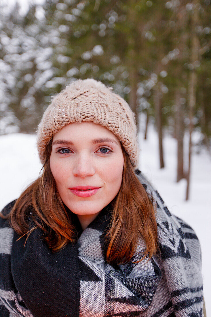 Young woman looking at camera, Spitzingsee, Upper Bavaria, Germany