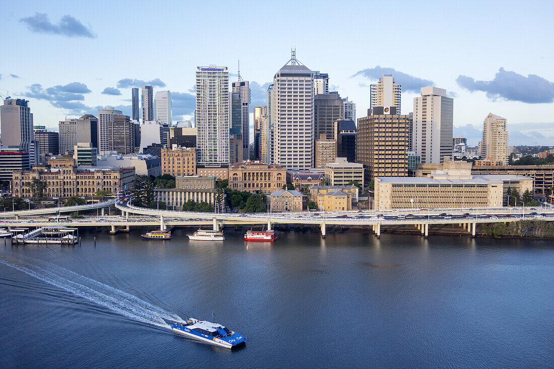 Australia, Queensland, Brisbane, Central, Business, District, CBD, city skyline, skyscrapers, buildings, view from South Bank, Pacific Motorway, M3, Brisbane River, Moon, dusk, CityCat, CityFerries, ferry, boat.