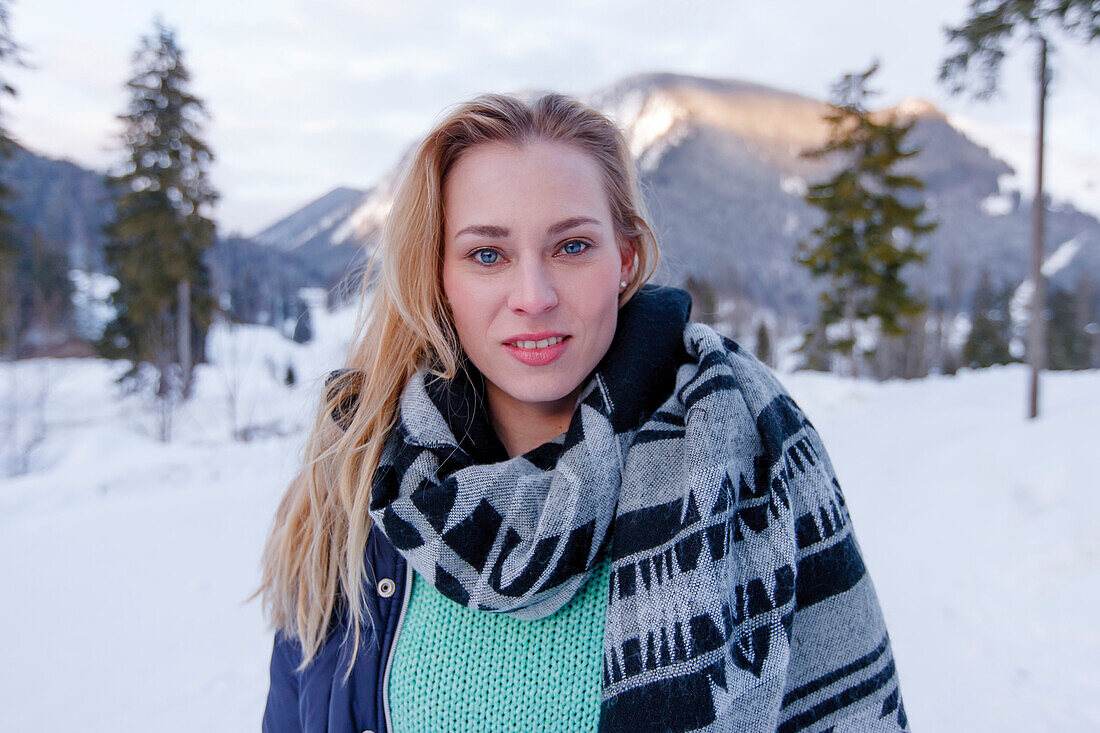 Young woman looking at camera, Spitzingsee, Upper Bavaria, Germany