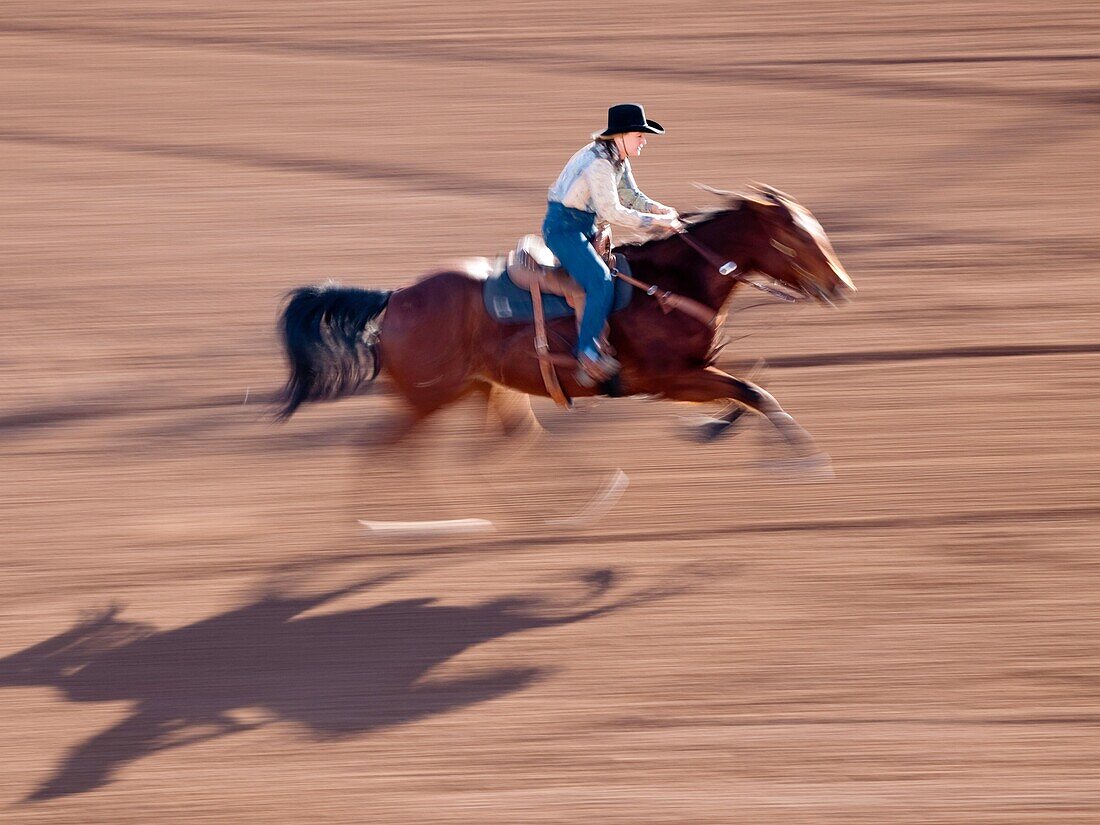 Barrel racing cowgirls at the Tucson Rodeo in Tucson, Arizona, United States