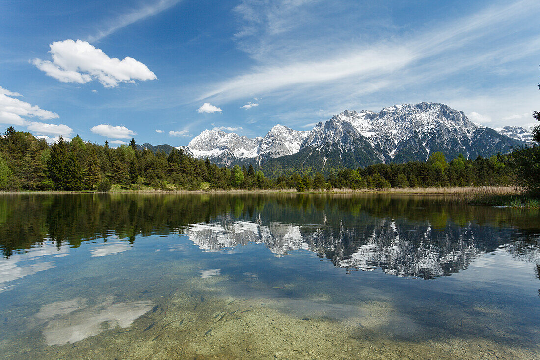 Luttensee, lake near Mittenwald in Spring with reflection, Karwendel mountains, Werdenfelser Land, Bavarian Alps, Upper Bavaria, Bavaria, Germany, Europe