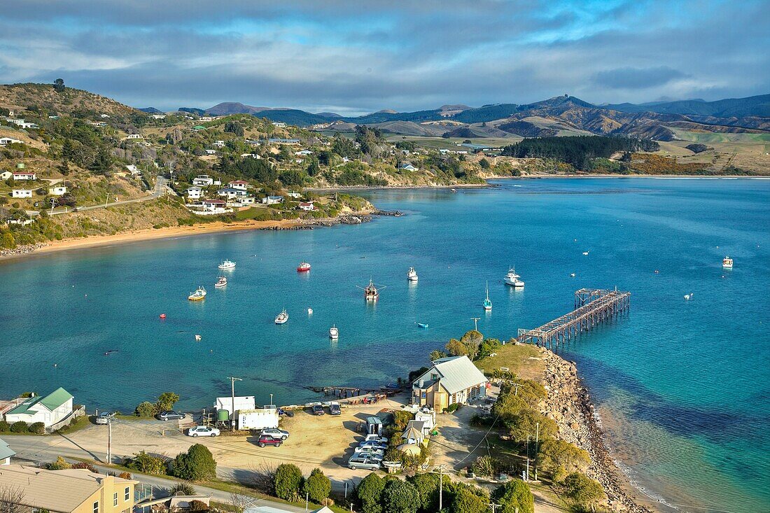 Harbour, fishing boats and Fleurs place restaurant, Moeraki, Otago, South Island, New Zealand