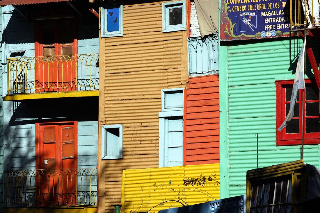 Colorful painted walls of houses with windows and doors, in El Caminito,La Boca, Buenos Aires, Argentina, South America
