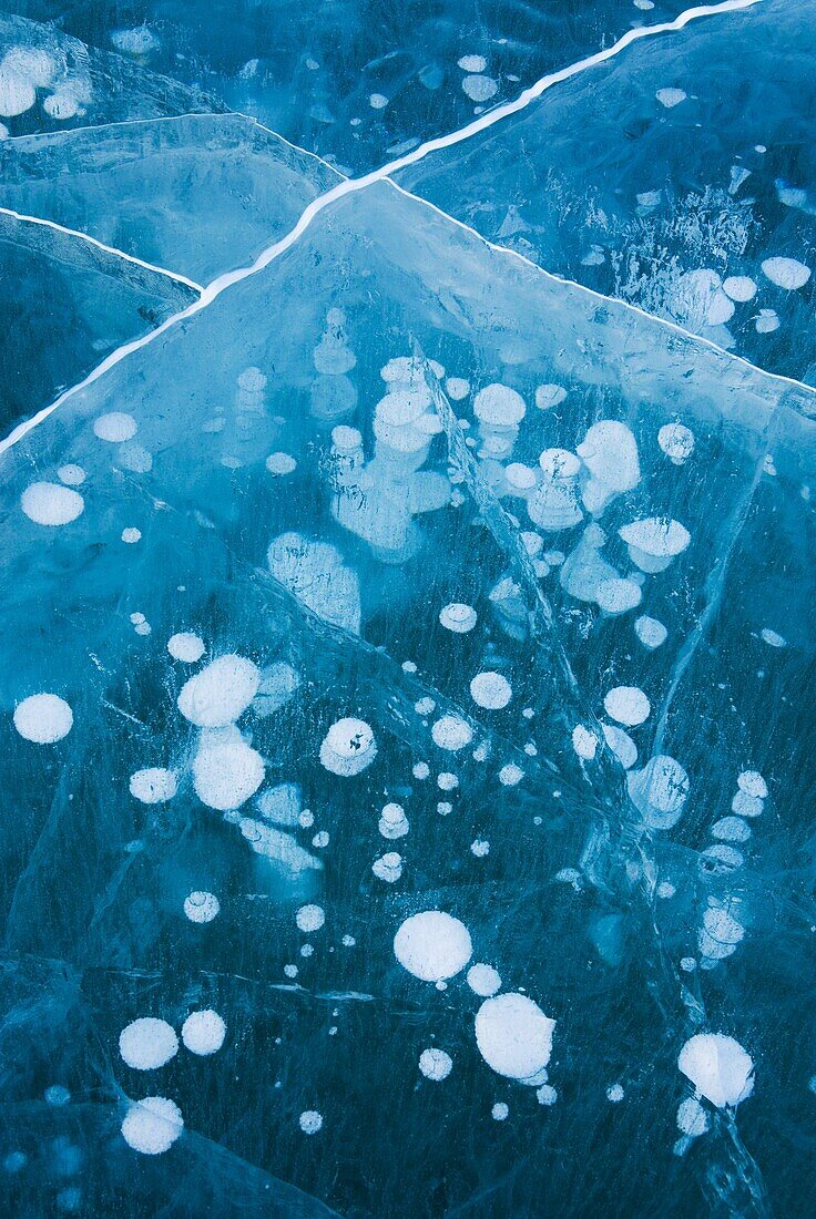 Abstract patterns in the wind polished ice of Abraham Lake, Alberta Canada