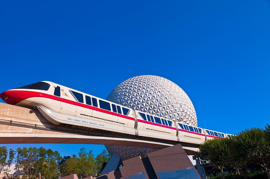 Monorail with Spaceship Earth geosphere in background, Epcot, Walt Disney World, Orlando, Florida USA
