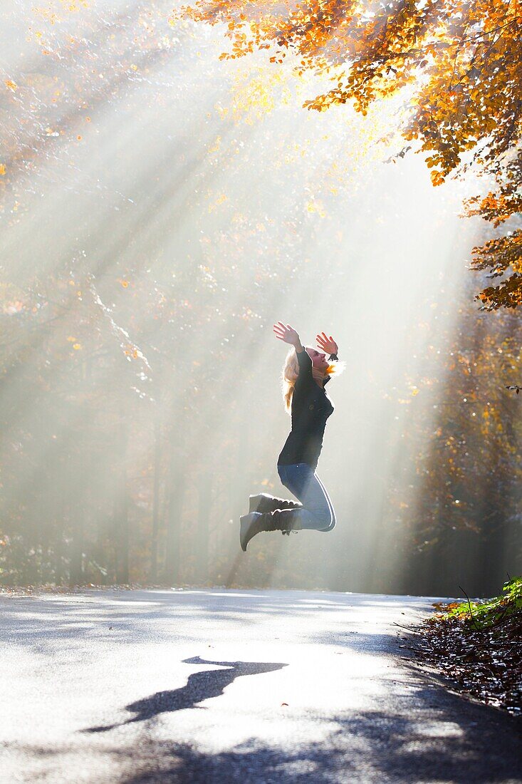 Young woman happy in Autumn