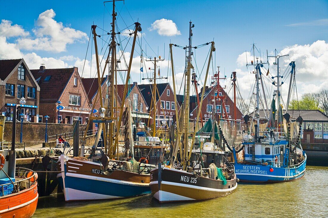 Fishing boats in the inner harbor of Neuharlingersiel, Germany, Europe