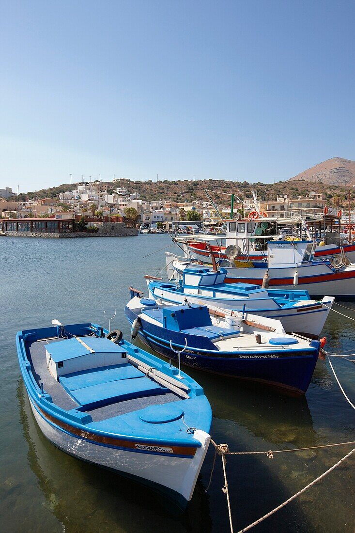 Fishing boats in Elounda village harbour  Crete, Greece