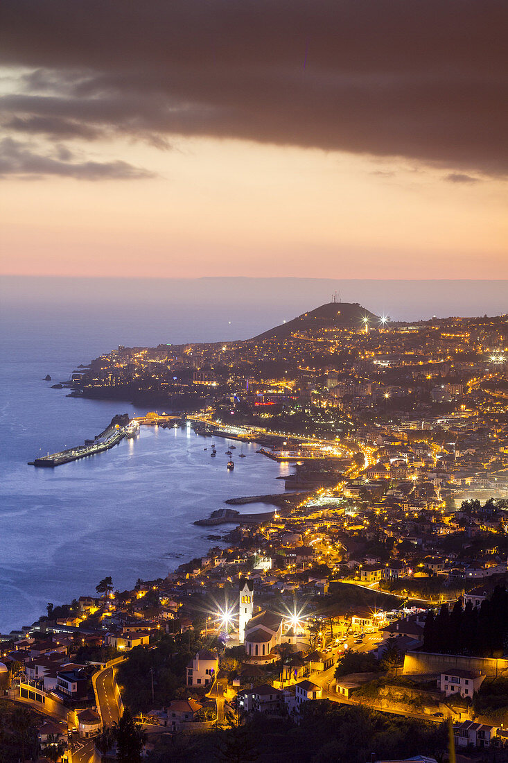Panoramic view of Funchal at sunset from das Neves viewer, Madeira, Portugal.