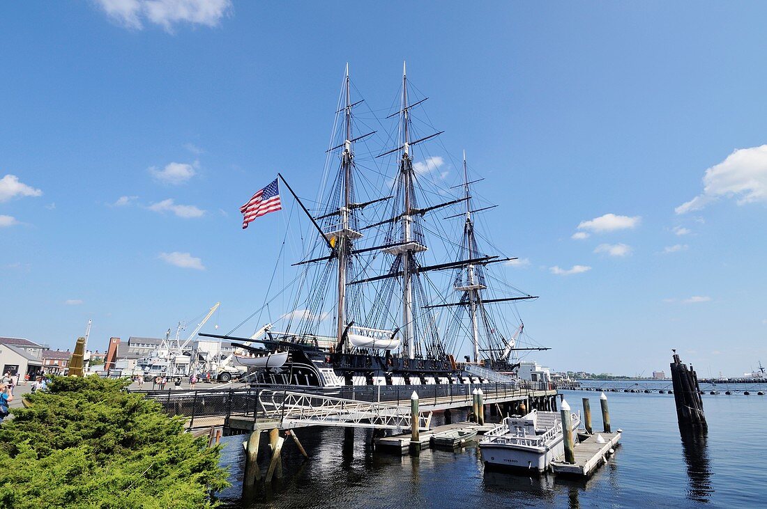 USS Constitution the oldest commissioned US Naval warship docked at the Charlestown Navy Yard Boston Massachusetts USA on a beautiful sunny summer day