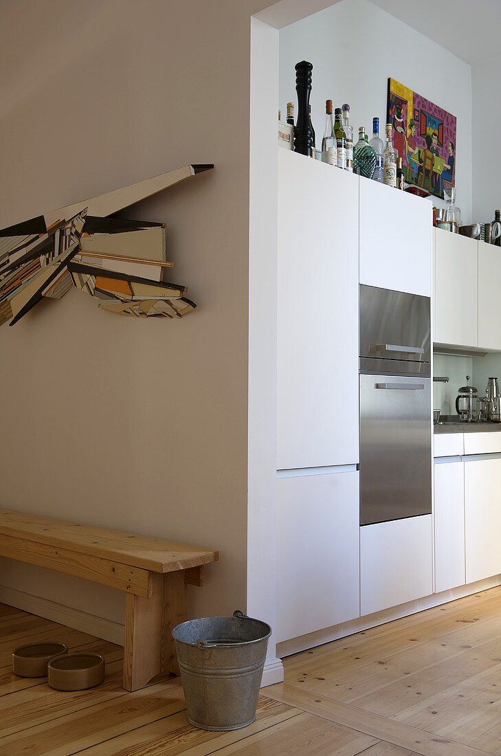 View into modern kitchen with integral oven