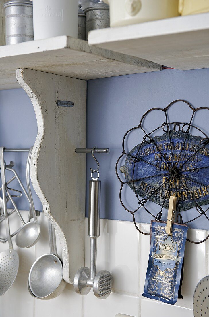 Kitchen utensils hanging on wall