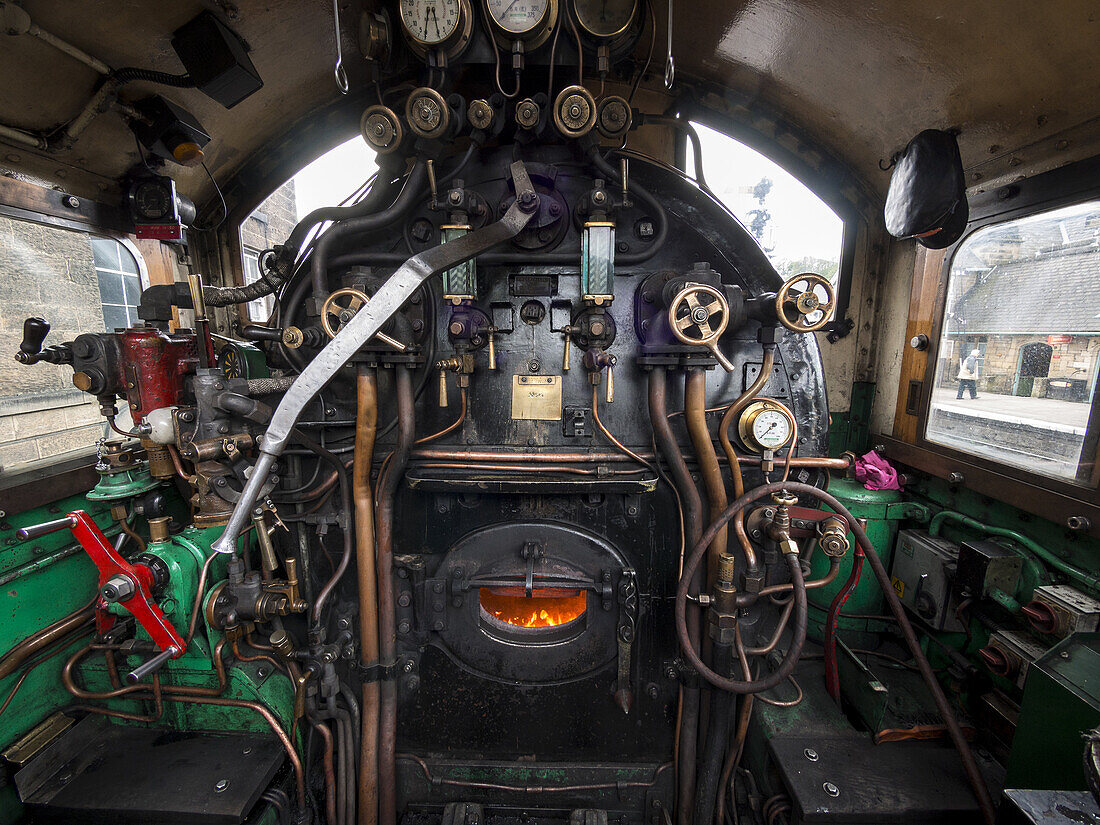 Detail of the controls of a vintage steam engine locomotive, North Yorkshire Moors Railway, on the North Yorkshire Moors, Yorkshire, UK.
