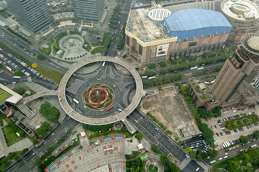 Aerial view of an innovative circular pedestrian bridge in the Pudong District of Shanghai, China.
