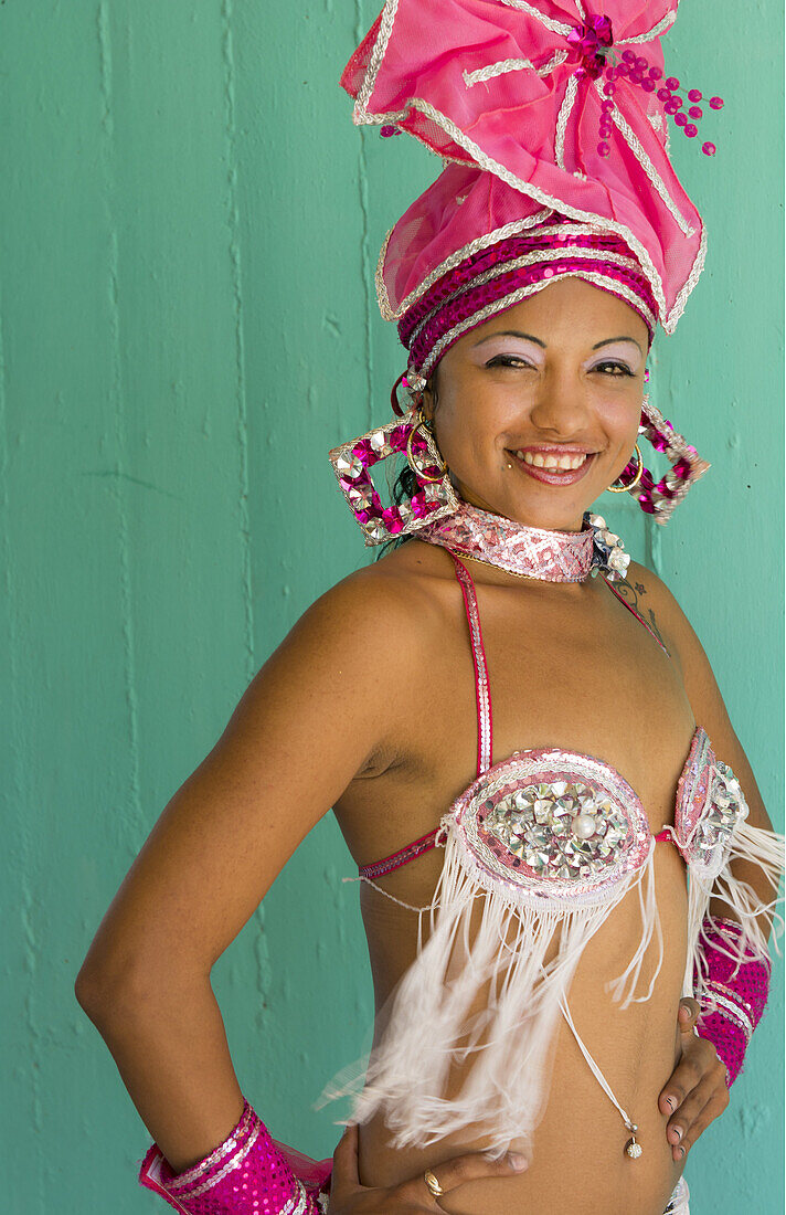 Trinidad Cuba beautiful dancer in costume portrait with headress and color from tourist show 12.