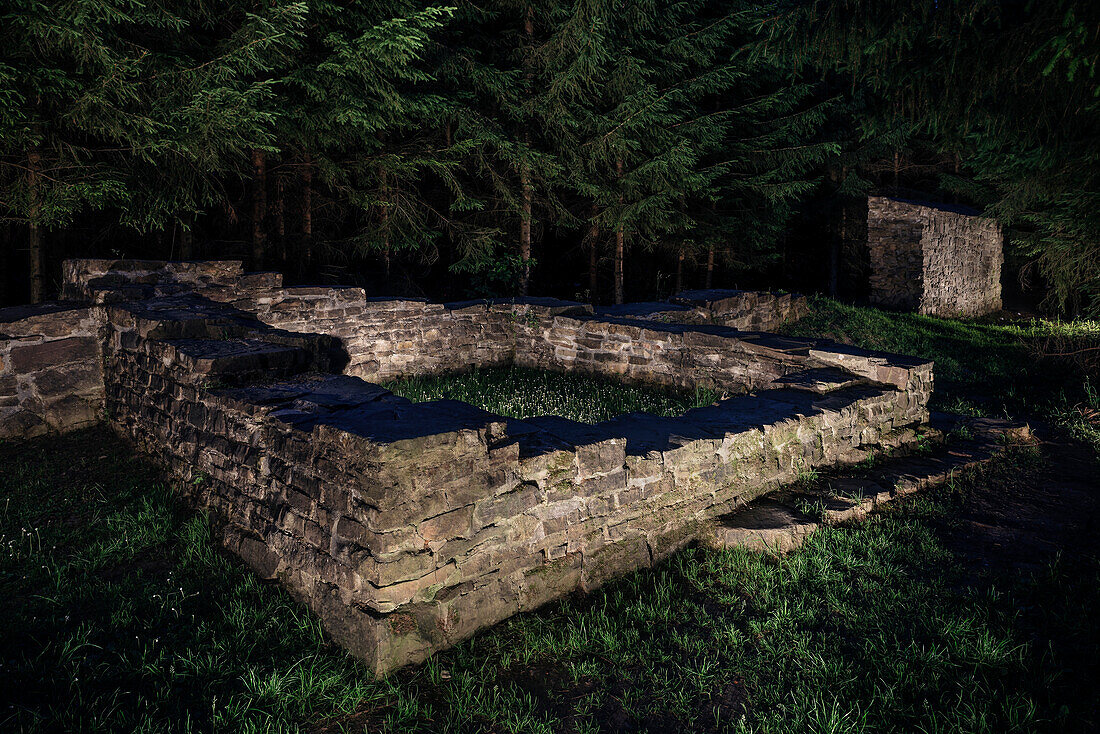 ruins of Roman built buildings at night, Limes (border wall of Roman Empire) Park Rainau-Buch, Aalen, Ostalb province, Swabian Alb, Baden-Wuerttemberg, Germany, UNESCO world heritage site