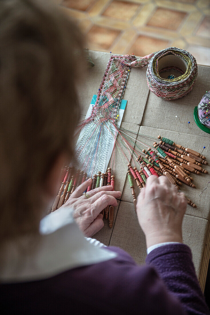 Elderly woman making lace, Vellberg, Schwaebisch Hall, Baden-Wuerttemberg, Germany