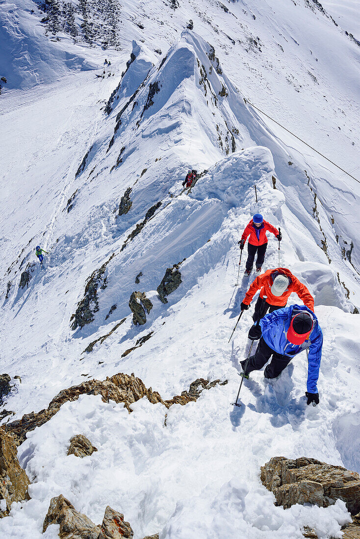 Three persons ascending on ridge towards Kleiner Kaserer, Kleiner Kaserer, valley of Schmirn, Zillertal Alps, Tyrol, Austria