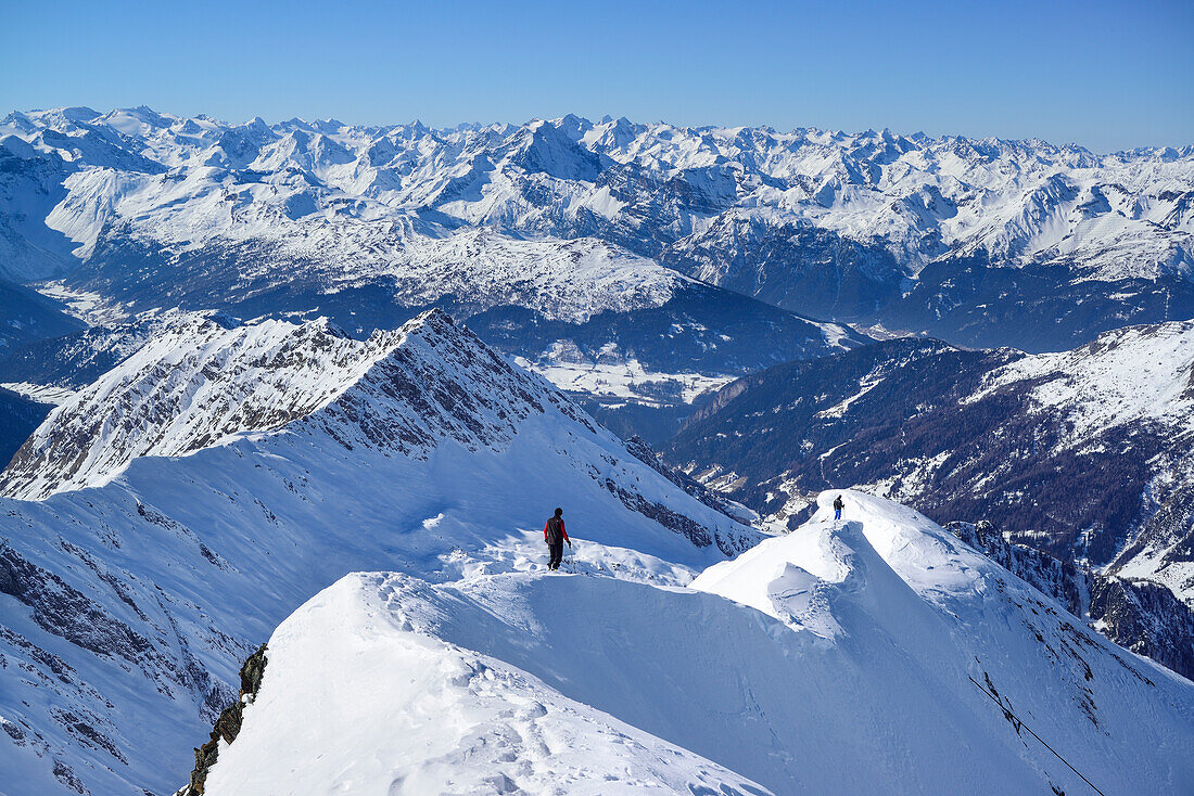Two persons descending on ridge from Kleiner Kaserer, Kleiner Kaserer, valley of Schmirn, Zillertal Alps, Tyrol, Austria
