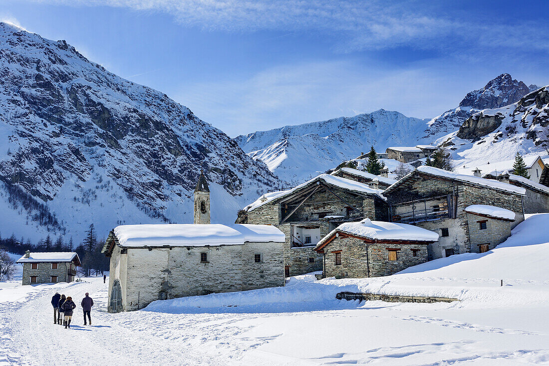 Snow-covered village of St. Anna, Valle Varaita, Cottian Alps, Piedmont, Italy