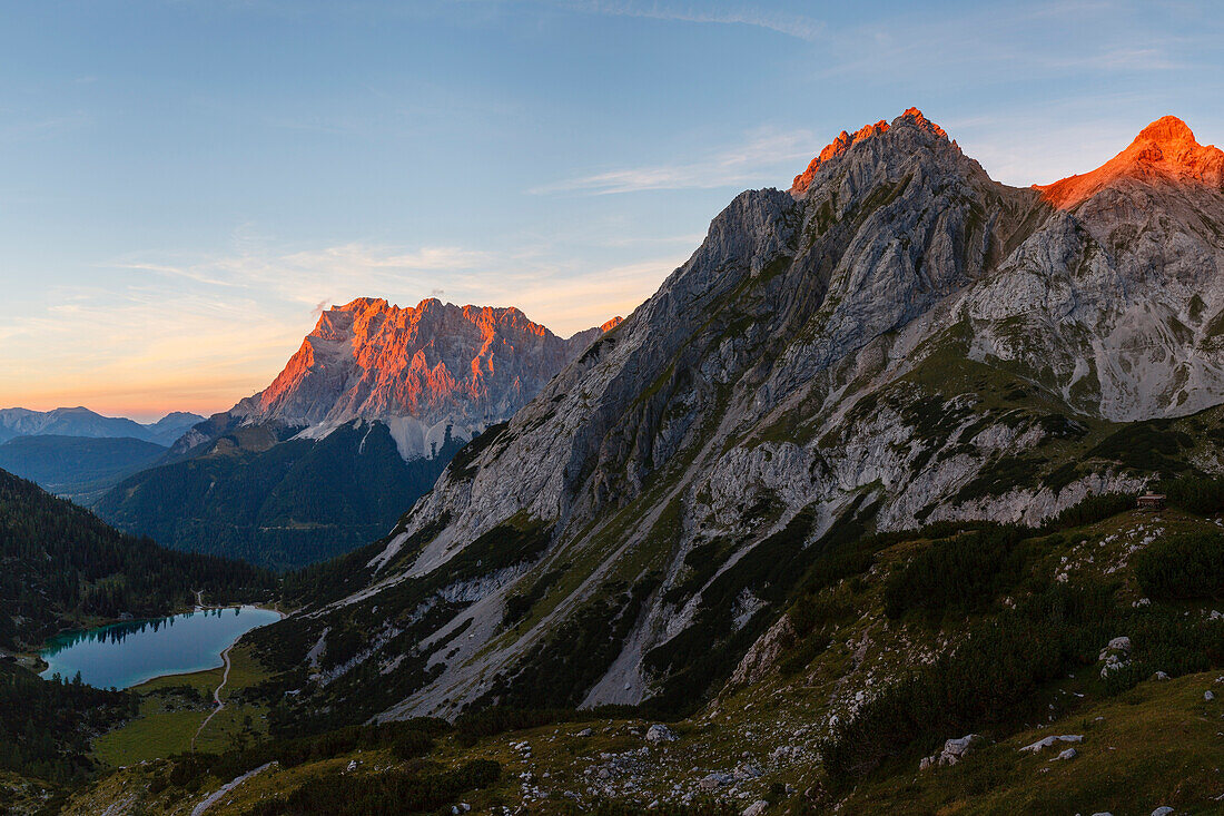 lake Seebensee, Wetterstein mountains with Zugspitze and Mieminger mountains at sunset, alpenglow, from the Coburger mountain hut, near Ehrwald, district Reutte, Tyrol, Austria, Europe