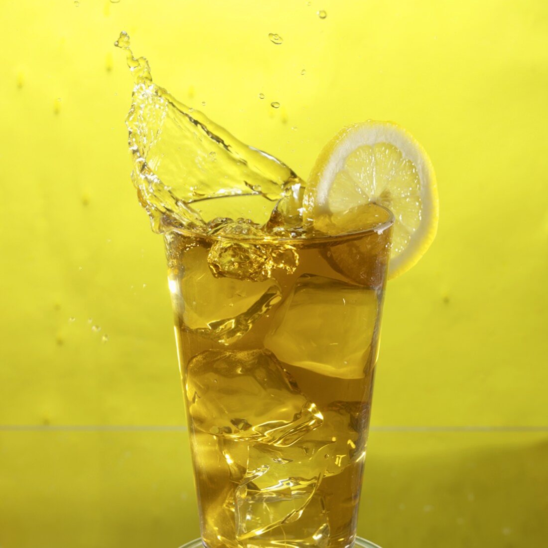 Glass of Iced Tea with Lemon, Splashing