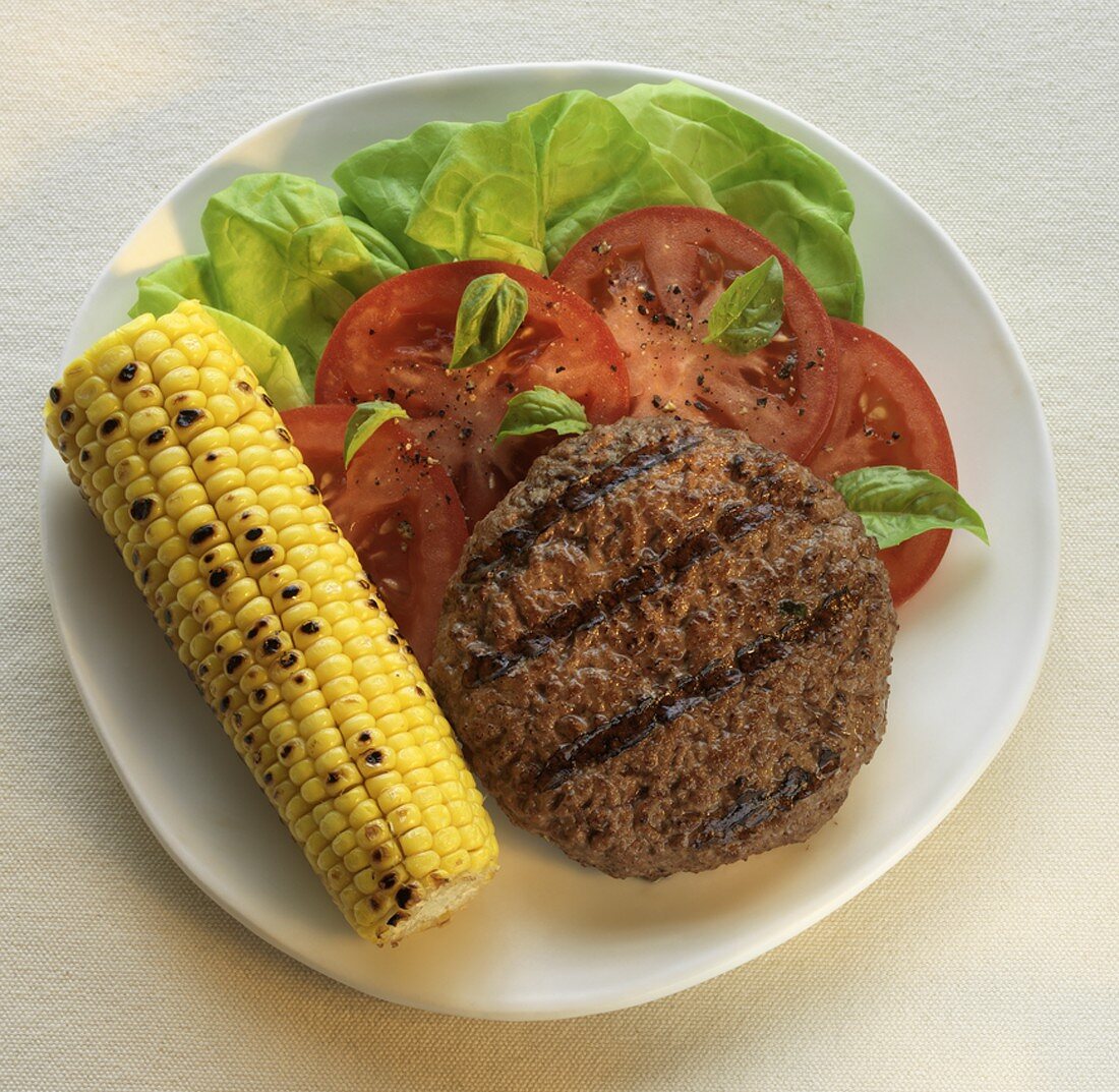 Grilled Sirloin Burger with Lettuce and Tomato, Grilled Corn on the Cob