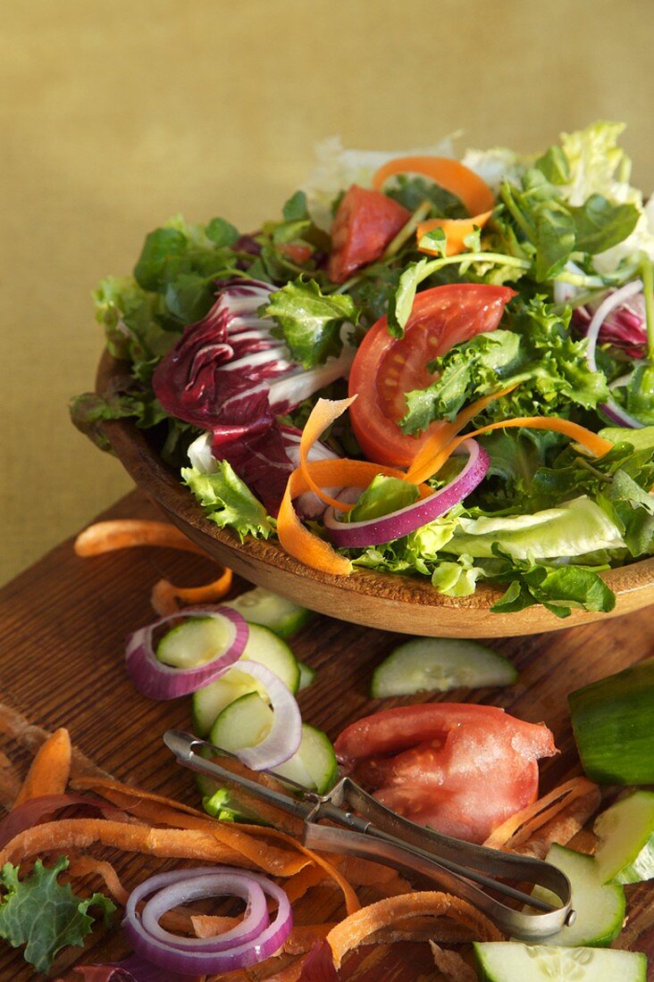 Colorful Salad in a Wooden Bowl Surrounded by Ingredients