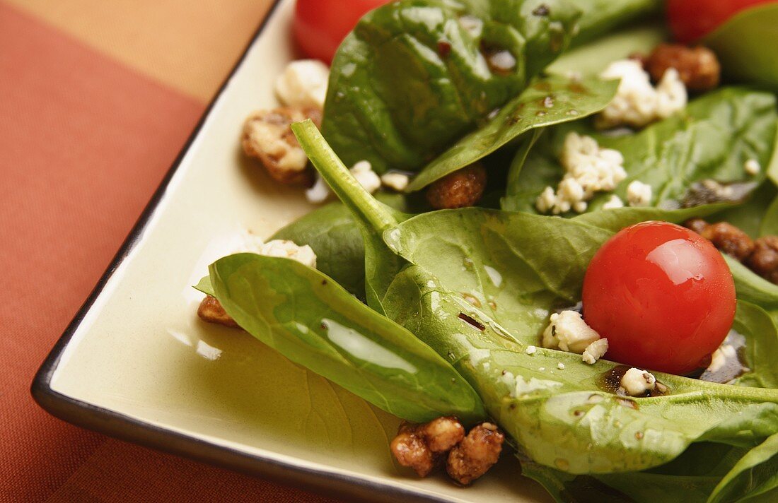 Spinach Salad with Crumbled Cheese and Tomato