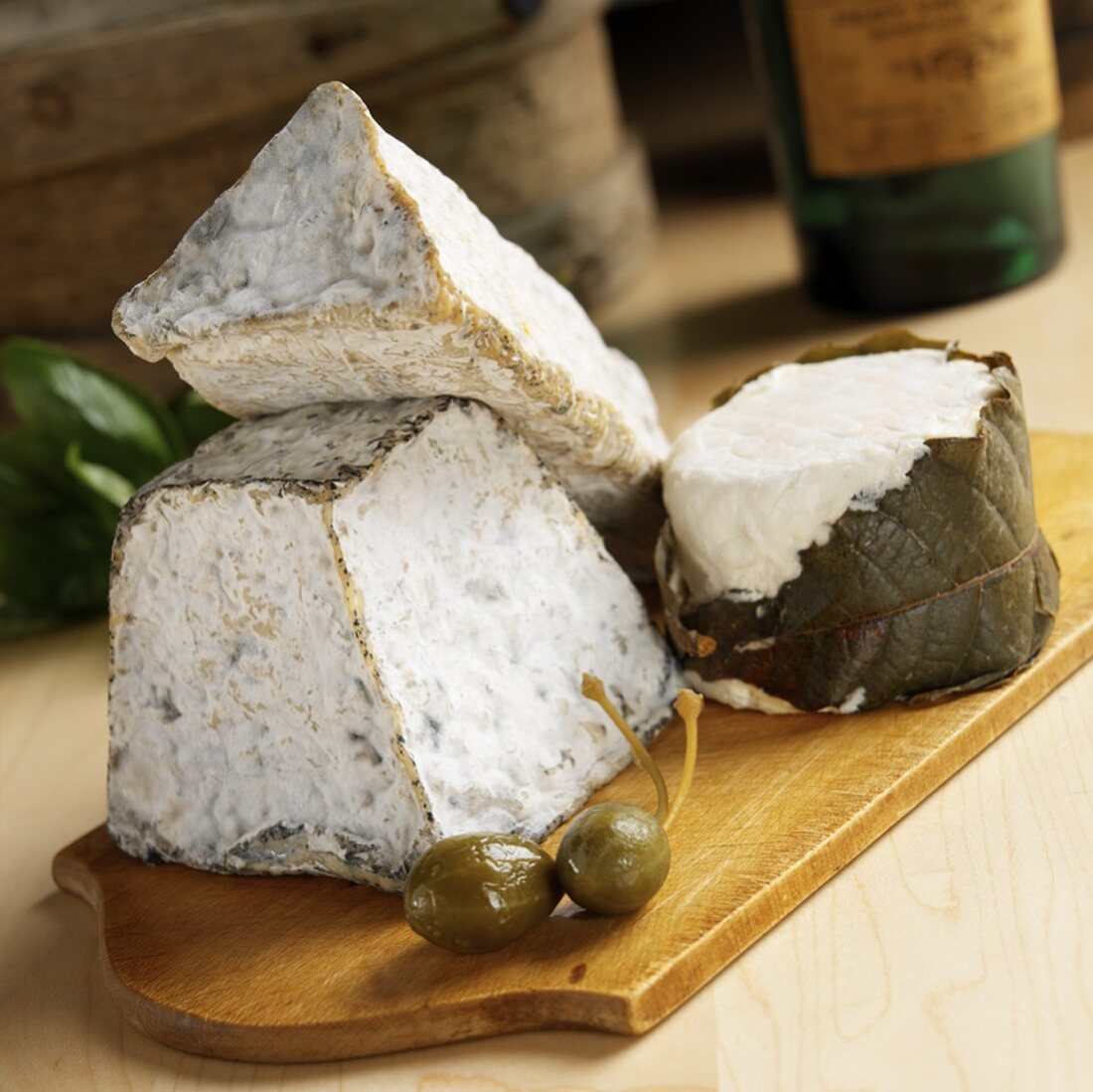 Three Types of Aged French Goat Cheese (LeGrand Carpin, Valencay Jaquin Ashed Pyramid & Chabis Perigord)