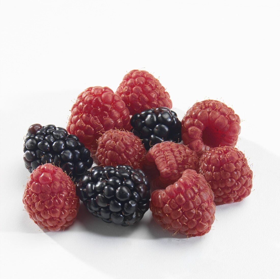 Raspberries and Blackberries on White