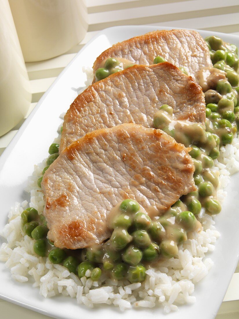 Pork Cutlets with Mushroom and Pea Sauce Over Rice