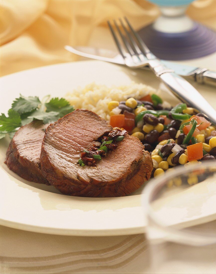 Slices of Stuffed Beef Filet with Corn and Black Bean Salad, Rice