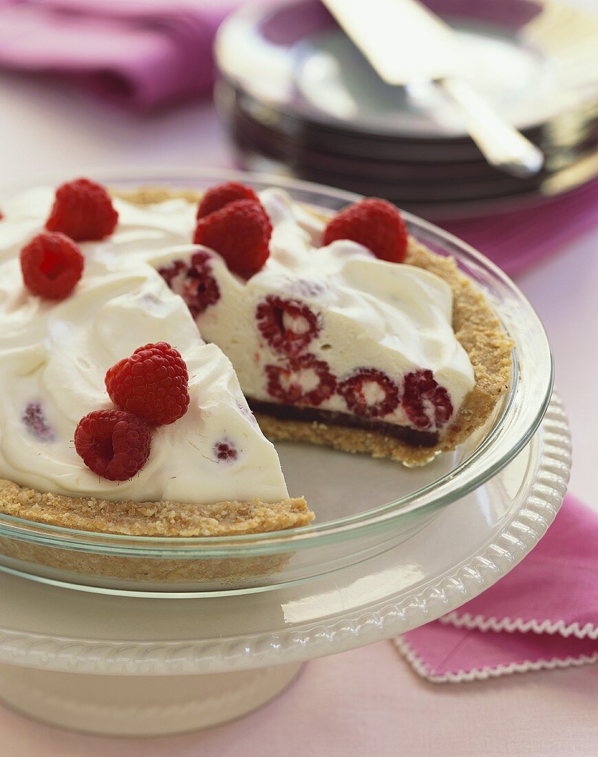 Raspberry Ice Cream Pie with Slice Removed in Baking Dish