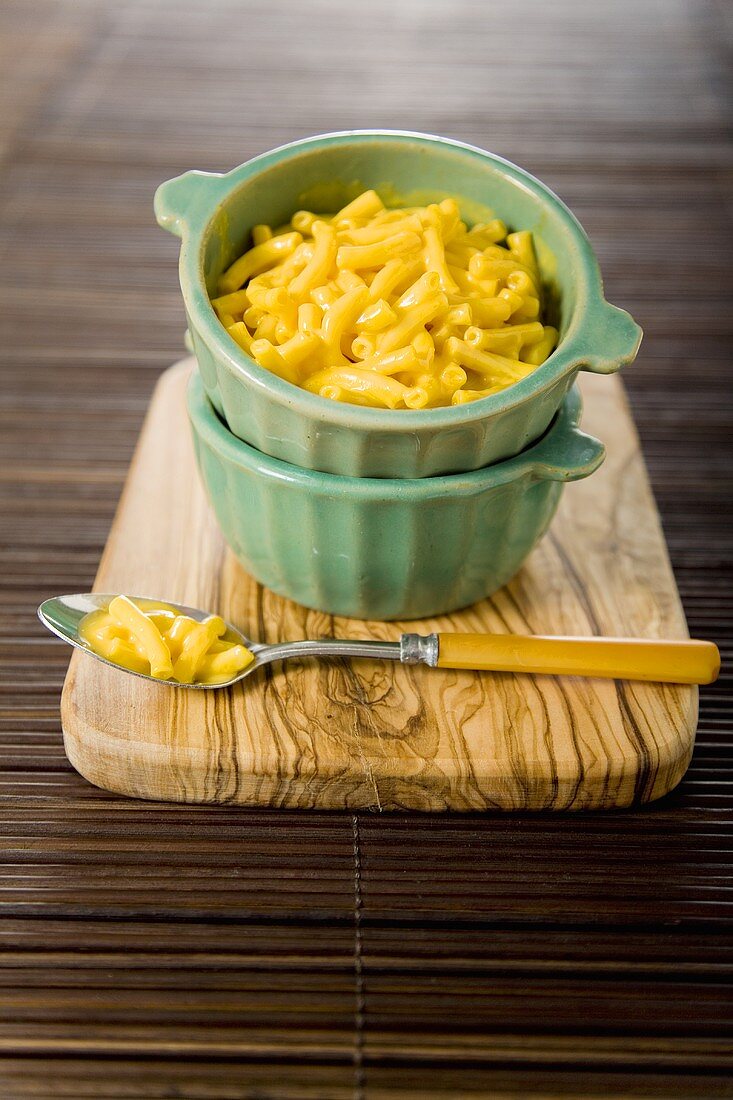 Macaroni and Cheese in a Bowl Stacked in a Bowl; Fork