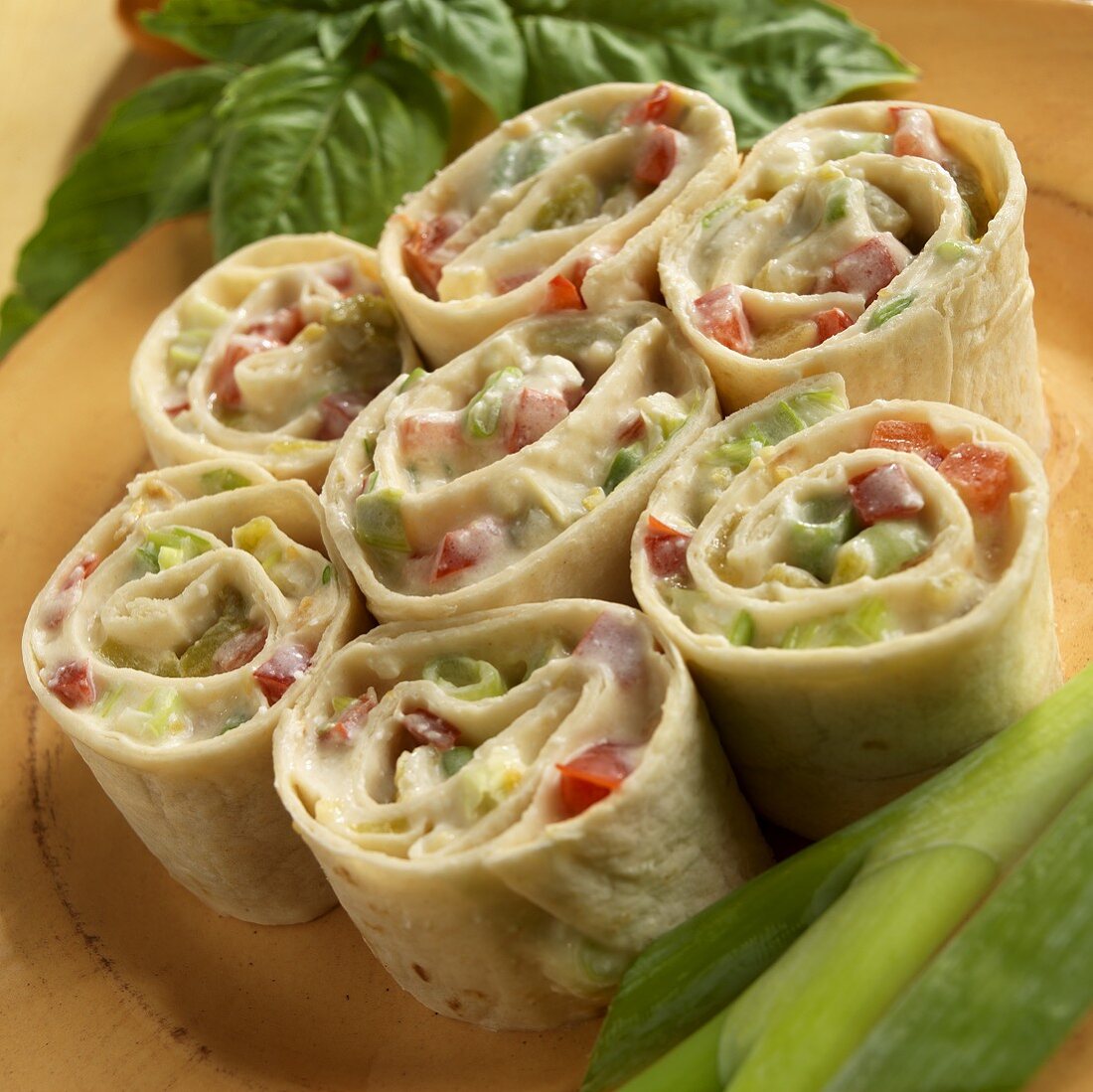 Pepper, Onion and Cheese Spirals on a Plate