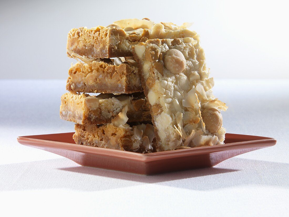 Macadamia, Butterscotch, White Chocolate Coconut Bars; Stacked