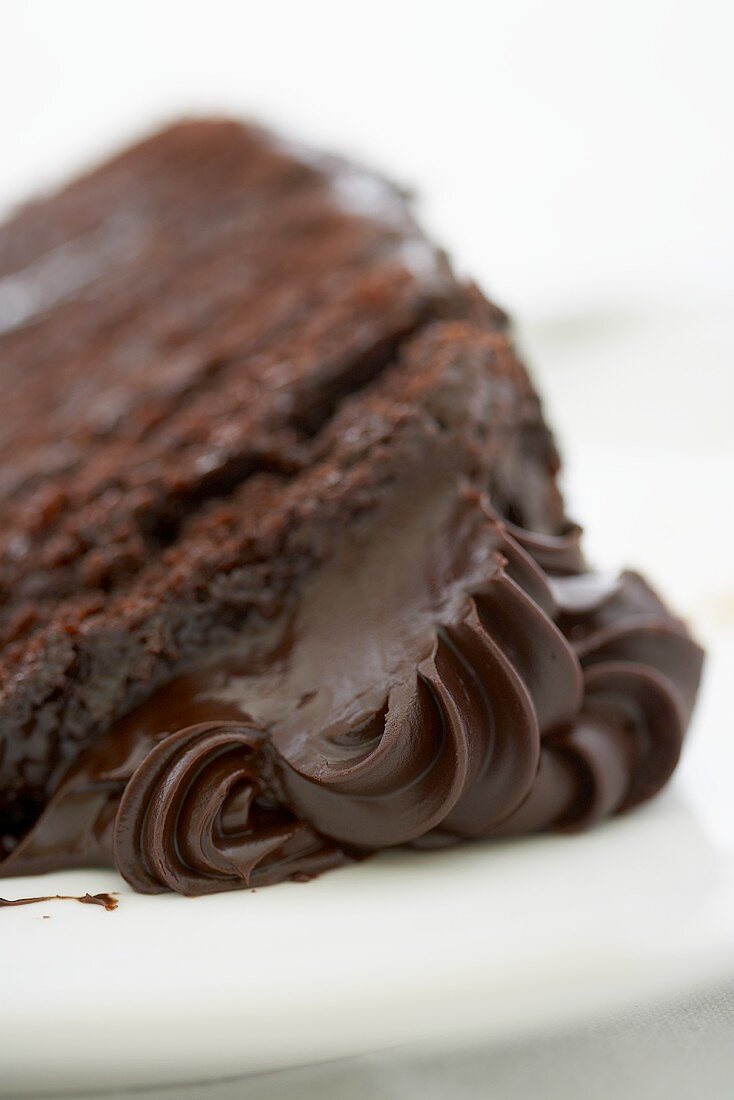Slice of Chocolate Layer Cake with Chocolate Fudge Frosting; Close Up