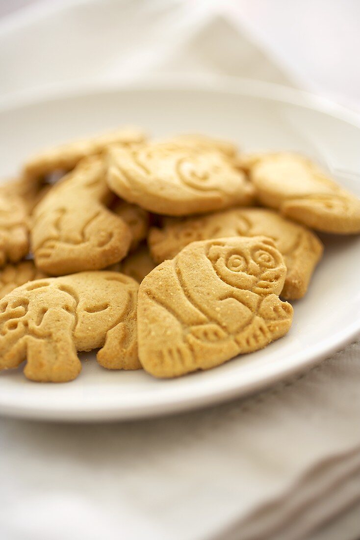Animal Crackers on a White Plate; Close Up