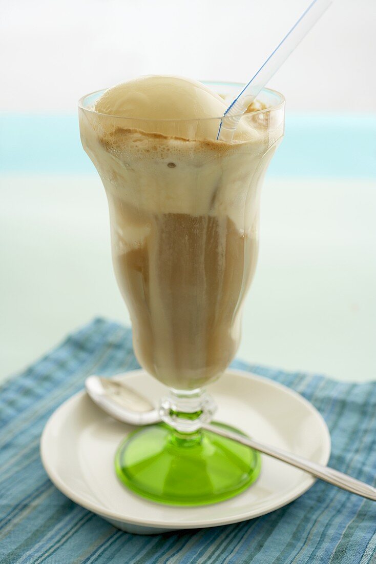 Root Beer Float on a Saucer with Straw and Spoon