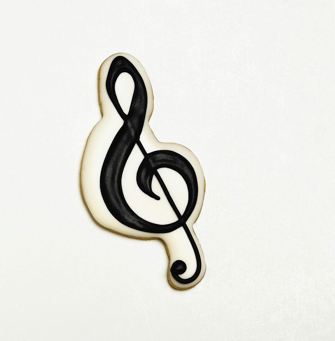 Treble Clef Sugar Cookie on a White Background