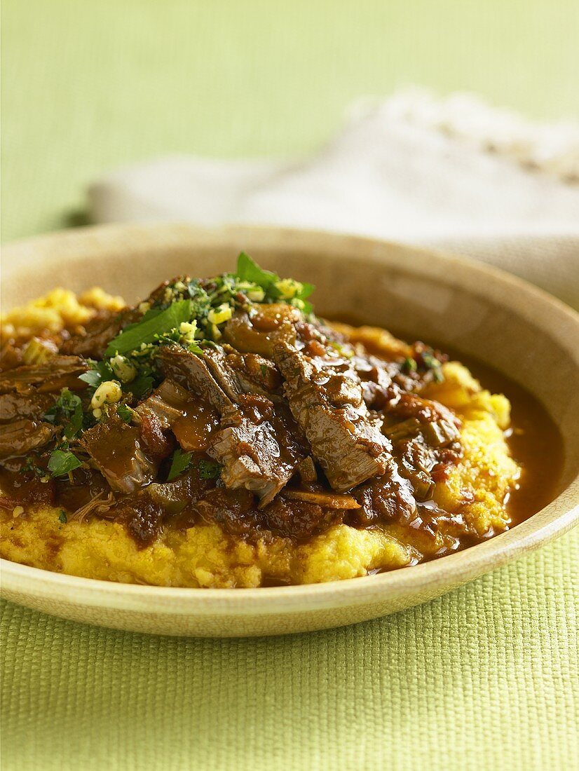 Bowl of Pot Roast Over Polenta