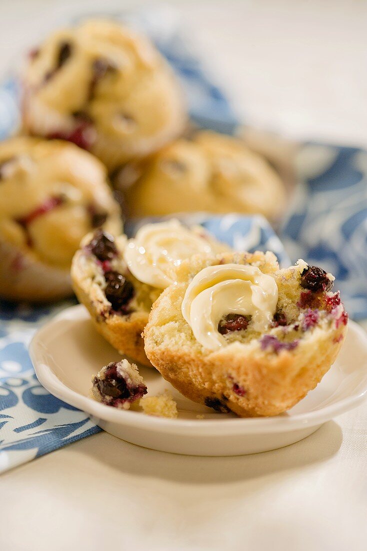 Blueberry Muffin Halved with Butter; Muffins