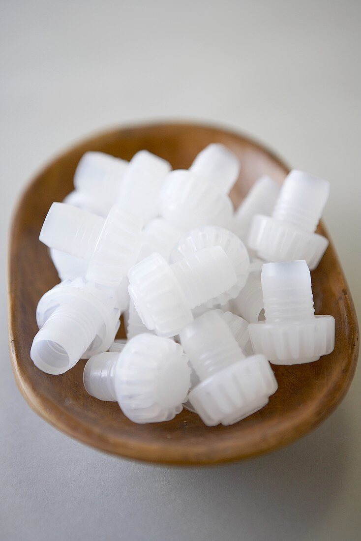 Bowl of Plastic Champagne Stoppers