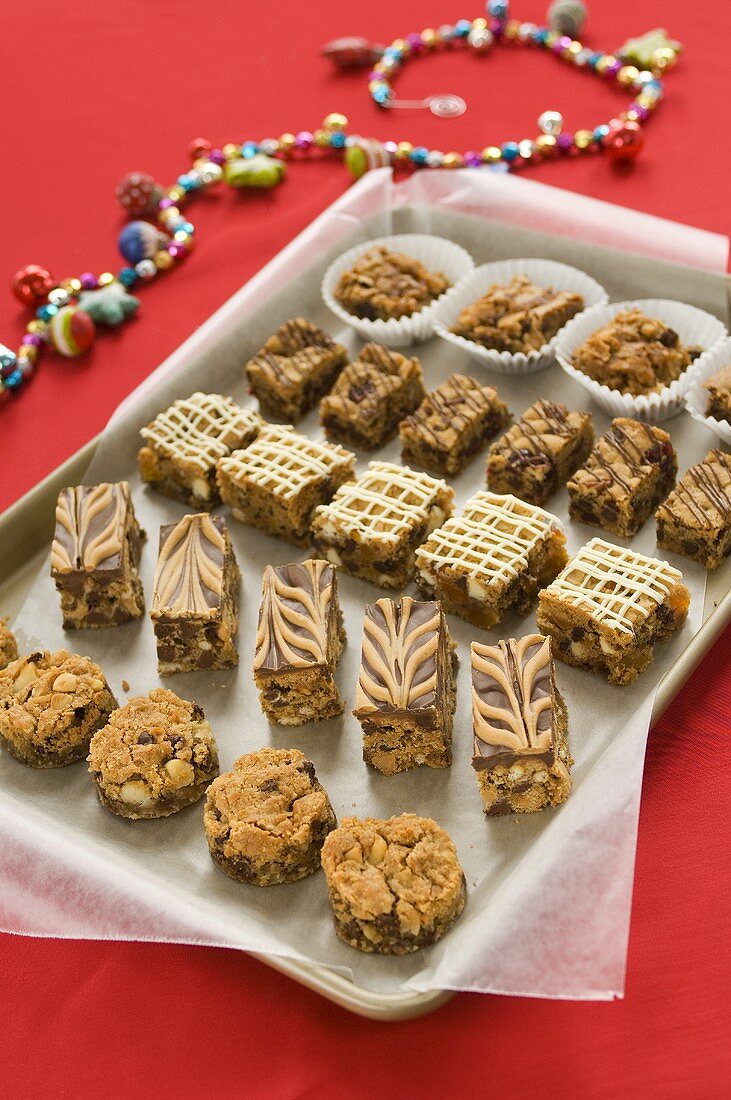 Parchment Paper Lined Pan of Bite-Size Baked Desserts, Christmas Beads