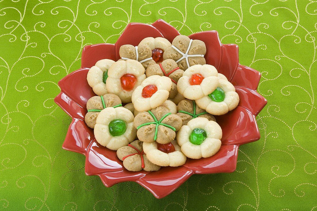 Bowl of Christmas Press Cookies on Green Table Cloth