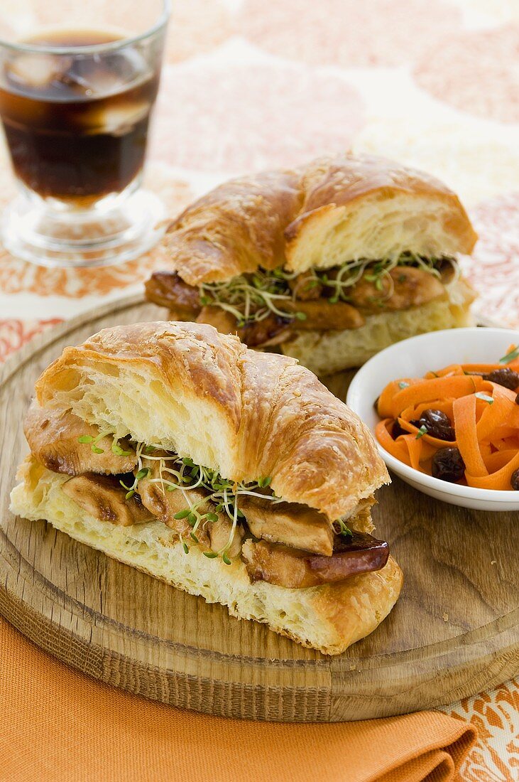 Chicken Sandwich with Sprouts on Croissant, Carrot & Raisin Salad