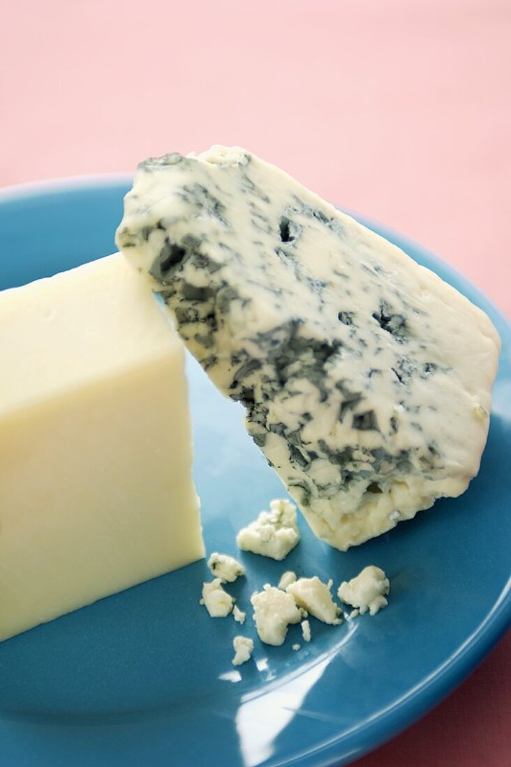 Two Wedges of Cheese on a Blue Plate, Blue Cheese and White Cheddar