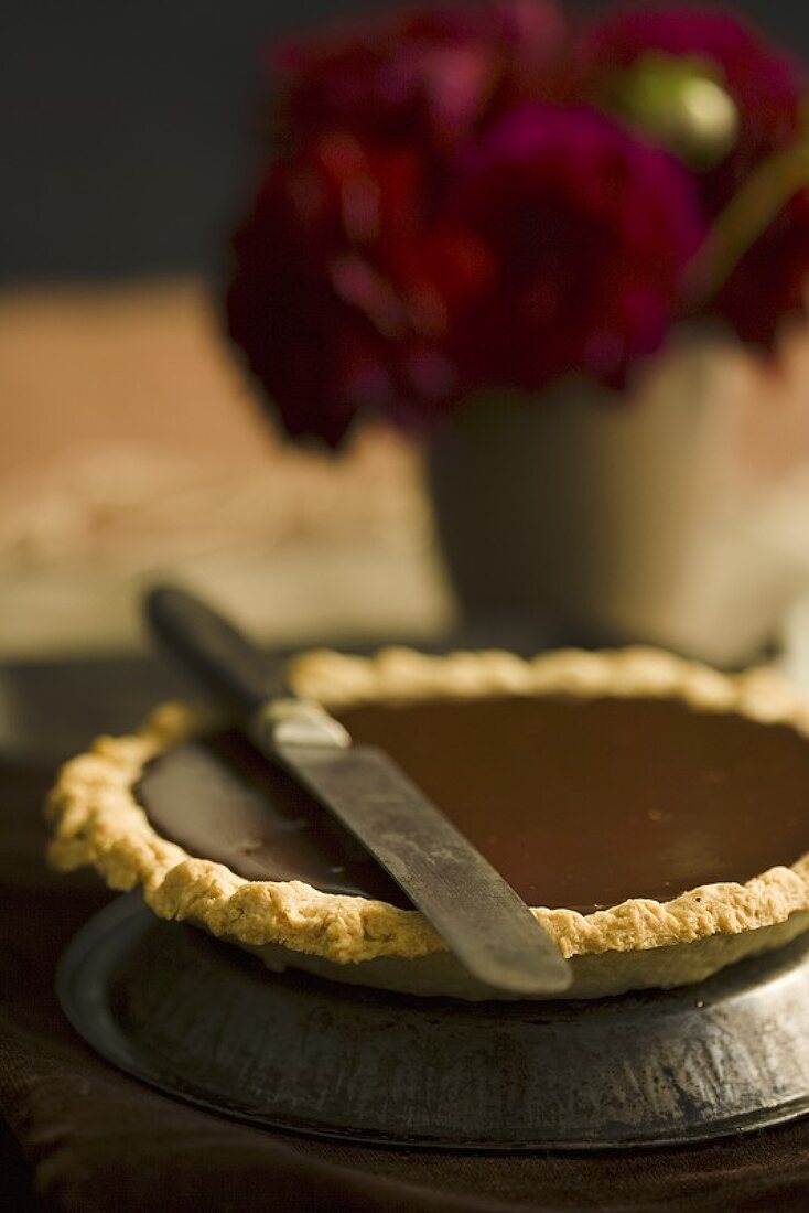 Whole Chocolate Pie with a Knife
