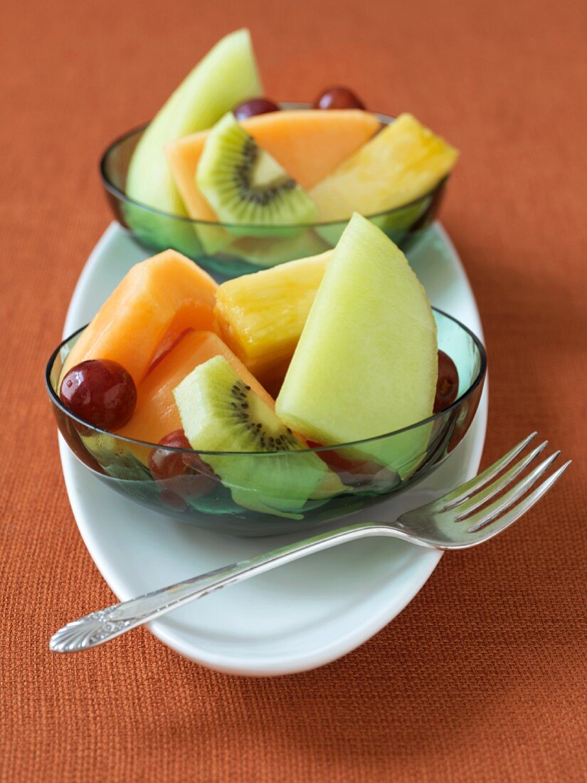 Fruit salad in two glass dishes